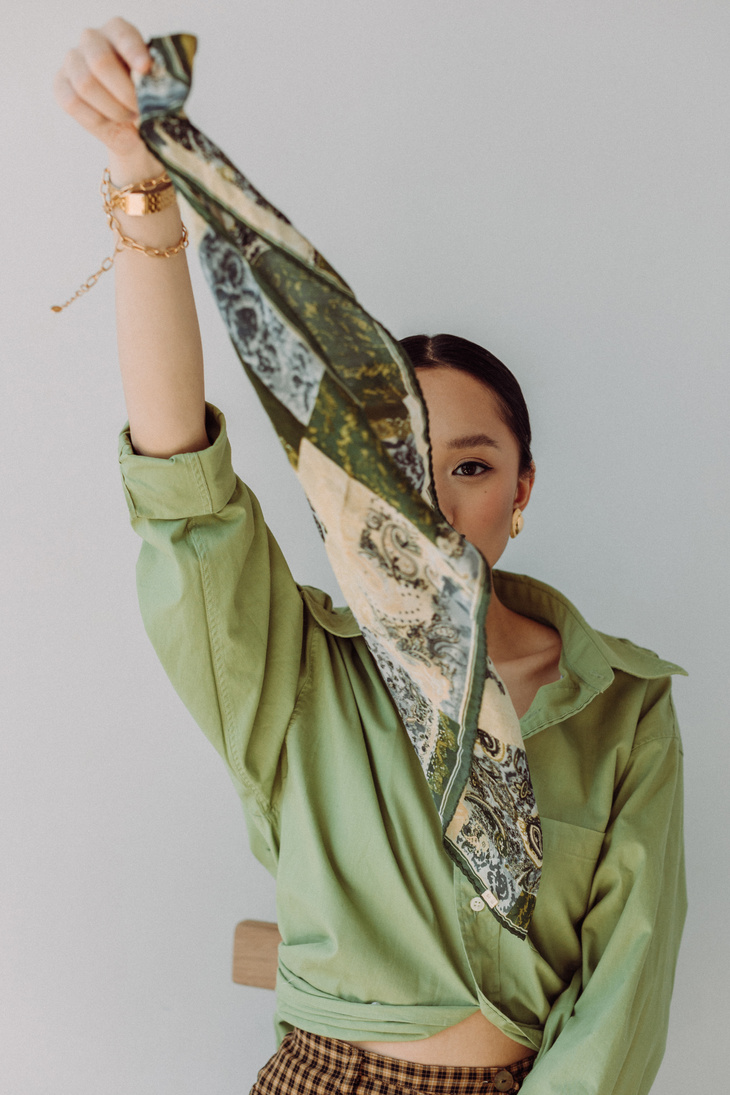 Woman Holding a Scarf
